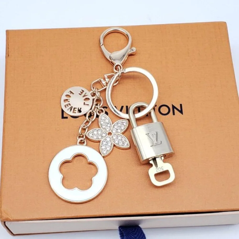 Authentic Louis Vuitton Gold Lock & Box w/ Unbranded Flower Bagcharm 120825